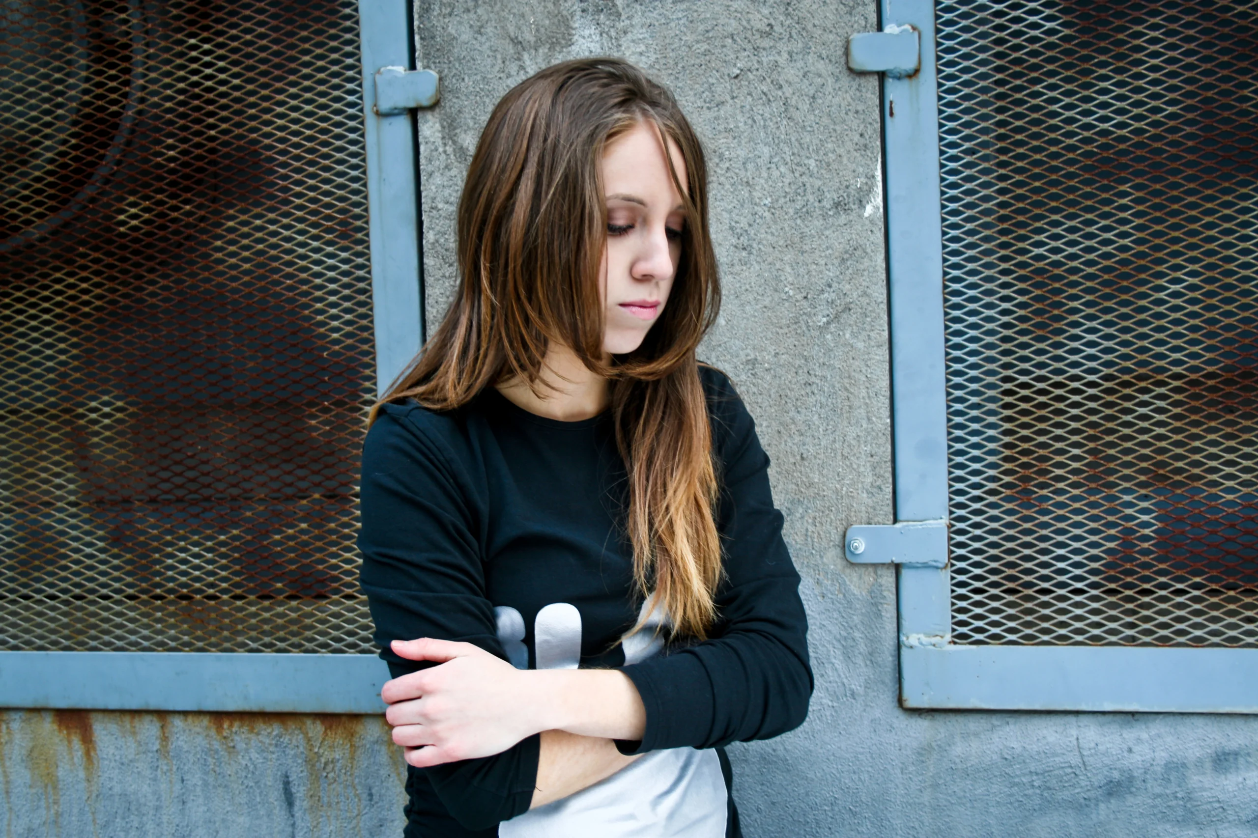 Young depressed woman struggling with drug addiction