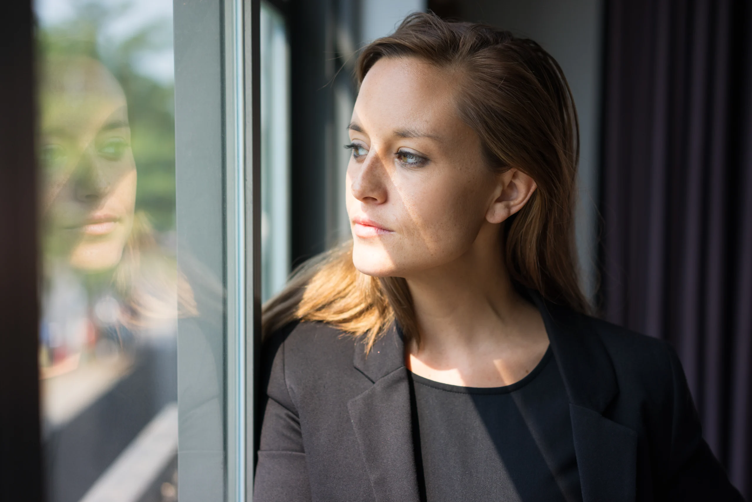 Woman looking out the window