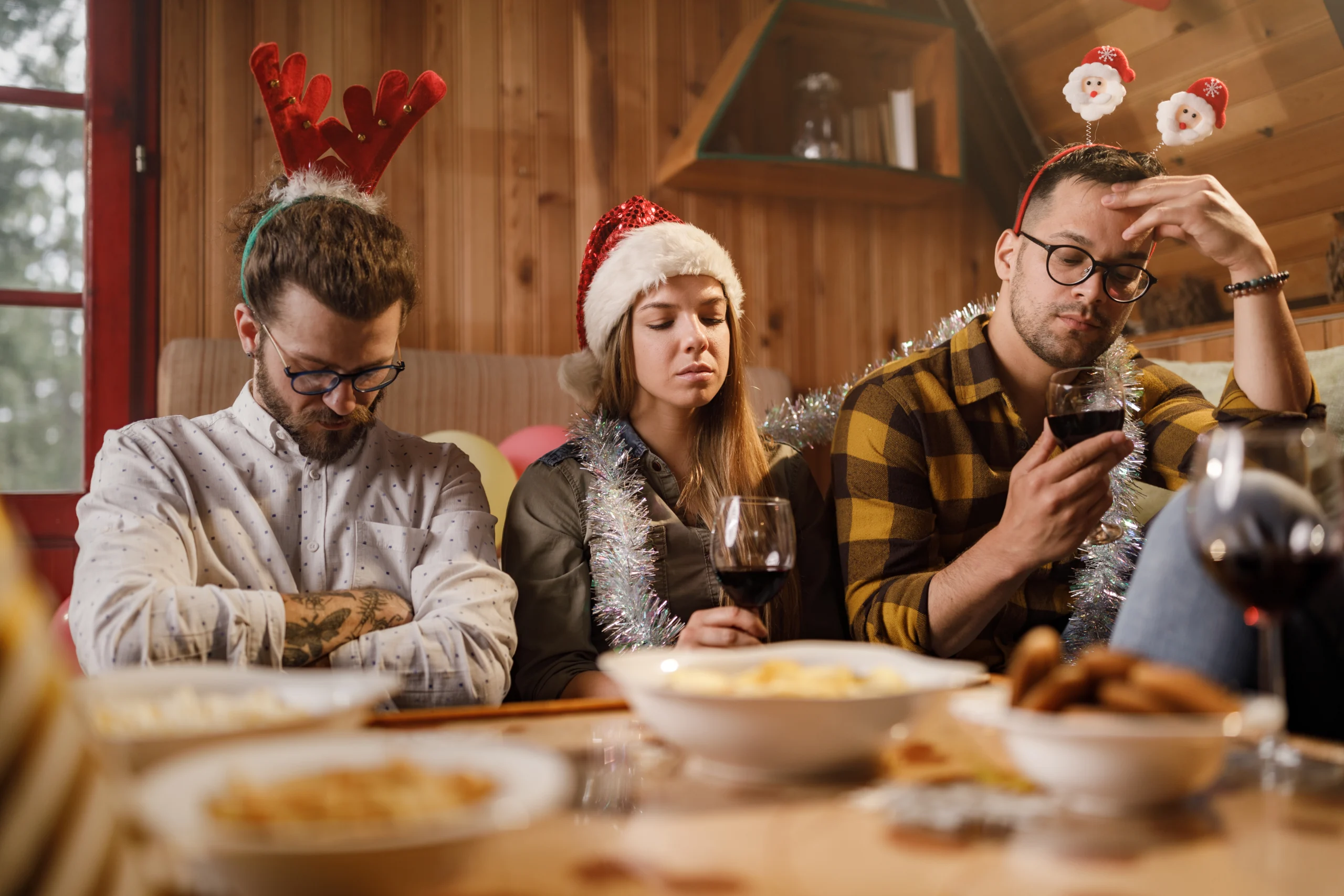 Young people feeling struggling with addiction New Year's party at home.