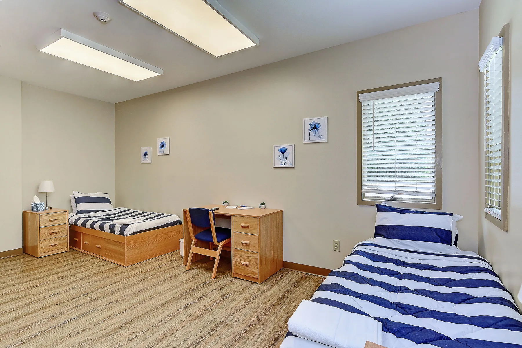 Shared bedroom with two beds at Freedom Detox
