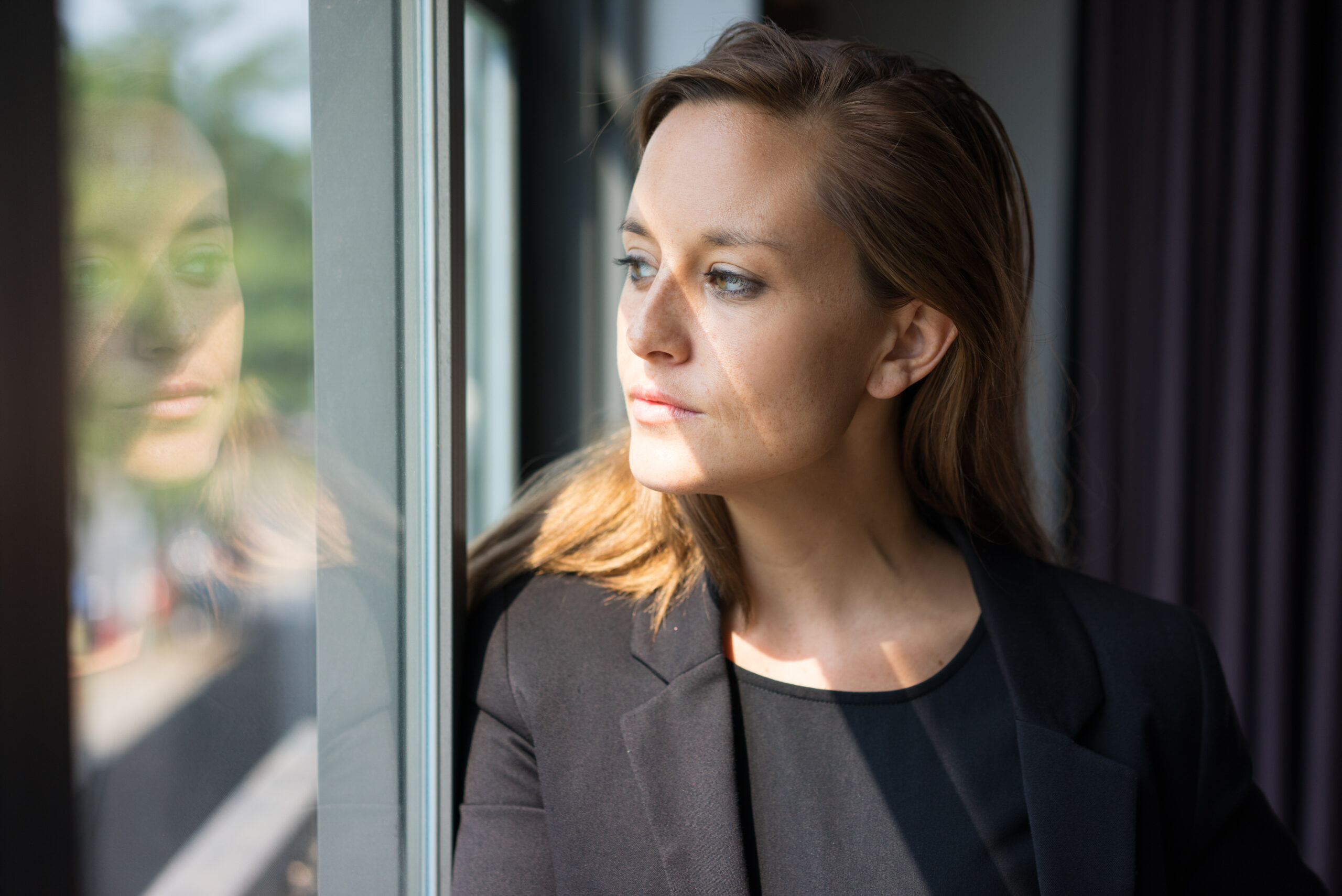 Woman looking out the window